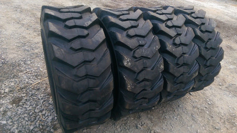 “Heavy duty skid steer tires with aggressive tread”
“SKS-1 and SKS-4 tires for Bobcat A300 and S750”
“Skid steer tires with red and silver rims”
“10x16.5 to 15x19.5 skid steer tire variants”
“Close-up of durable construction skid steer tire”
