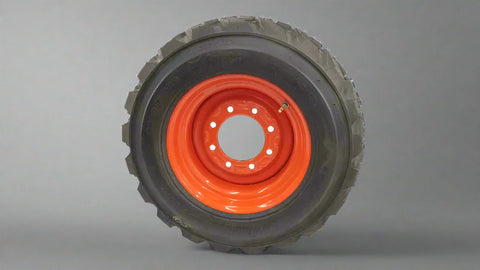 “Heavy duty skid steer tires with aggressive tread”
“SKS-1 and SKS-4 tires for Bobcat A300 and S750”
“Skid steer tires with red and silver rims”
“10x16.5 to 15x19.5 skid steer tire variants”
“Close-up of durable construction skid steer tire”