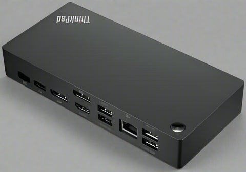 Lenovo ThinkPad USB-C Dock top view
Docking station with HDMI, DisplayPort, and USB ports
Open box dock with accessories included
Rear panel showing power and video output ports