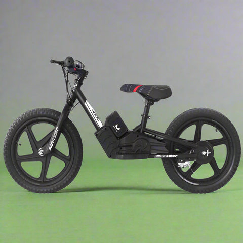 Kids 16" black electric balance bike with training wheels
Side view of 12" black lithium e-bike for children