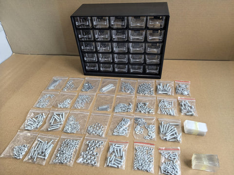Multipurpose fastener kit with labeled drawers
1001-piece screw and bolt organizer cabinet
Open storage cabinet with hardware compartments
Assorted fasteners and storage trays
Compact metal fastener case for shop and garage use