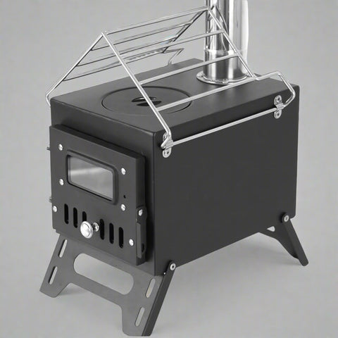 Portable wood burning stove for tent heating
Compact camp heater with chimney pipe
Foldable wood stove with cooking surface
Outdoor tent stove heating in camping setup
Stainless steel wood-burning camping heater