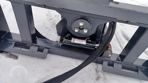 CPD1284H Skid Steer Post Driver mounted on skid steer
Side view of Quick Sledge hydraulic post driver on worksite
Self-contained fence post driver close-up with universal mount
Post driver driving steel post into ground on rocky terrain
Compact skid steer post driver for fencing and landscaping