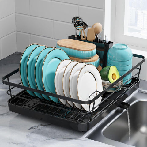 Compact stainless steel dish rack with white bowls and plates
Close-up of drainboard draining water into sink
Side view of dish rack showing utensil holder
All parts of dish rack laid out for assembly
Stainless steel rack in modern kitchen setting
