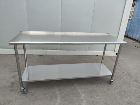 Stainless steel rolling work table with locking wheels – front view
48-inch stainless steel prep station with under-shelf and casters
72-inch commercial kitchen table with wheels – side angle
Mobile food service prep table with heavy-duty design
Industrial stainless table in warehouse environment