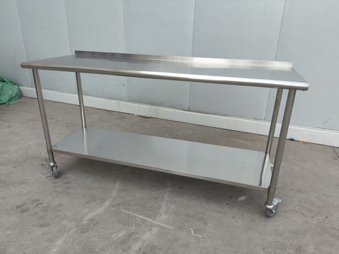 Stainless steel rolling work table with locking wheels – front view
48-inch stainless steel prep station with under-shelf and casters
72-inch commercial kitchen table with wheels – side angle
Mobile food service prep table with heavy-duty design
Industrial stainless table in warehouse environment