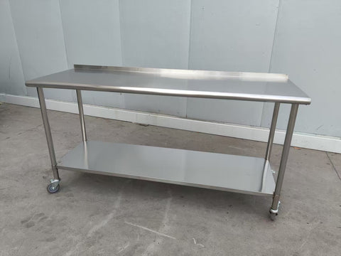 Stainless steel rolling work table with locking wheels – front view
48-inch stainless steel prep station with under-shelf and casters
72-inch commercial kitchen table with wheels – side angle
Mobile food service prep table with heavy-duty design
Industrial stainless table in warehouse environment
