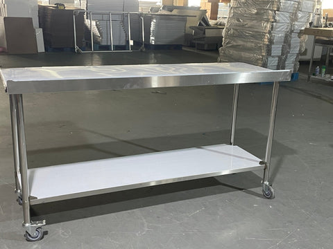 Stainless steel rolling work table with locking wheels – front view
48-inch stainless steel prep station with under-shelf and casters
72-inch commercial kitchen table with wheels – side angle
Mobile food service prep table with heavy-duty design
Industrial stainless table in warehouse environment