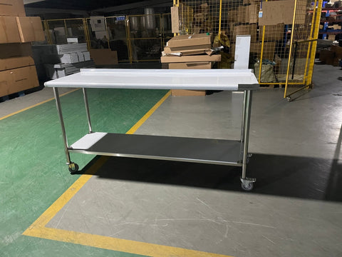 Stainless steel rolling work table with locking wheels – front view
48-inch stainless steel prep station with under-shelf and casters
72-inch commercial kitchen table with wheels – side angle
Mobile food service prep table with heavy-duty design
Industrial stainless table in warehouse environment