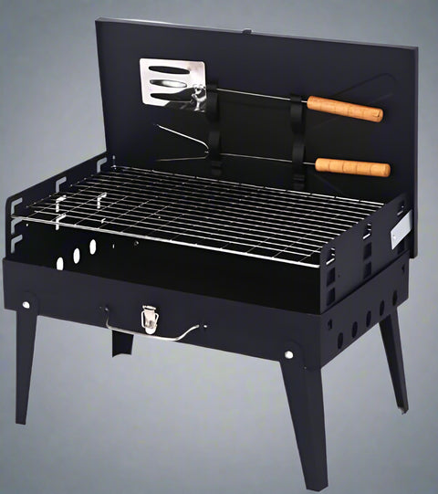 Portable suitcase-style BBQ grill folded open
Compact charcoal grill for travel and camping
Portable BBQ with meat and vegetables on the grill
Folding grill shown in backyard setup
BBQ grill packed for outdoor picnic