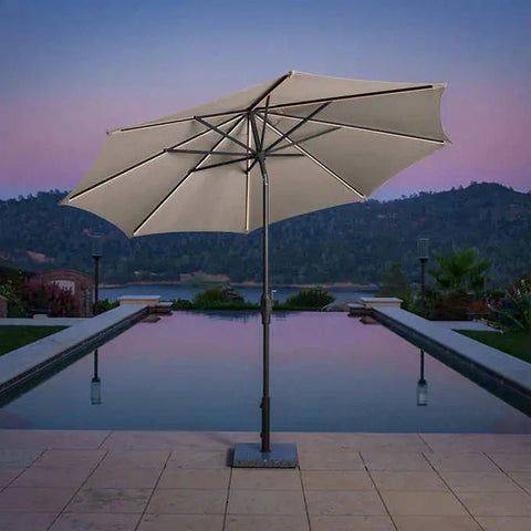 “SunVilla 10 FT LED Patio Umbrella at sunset”
“360-degree solar-powered umbrella with Outdura canopy”
“Tan SunVilla umbrella with LED lights open on patio”
“Outdoor umbrella with auto tilt feature – gray color”