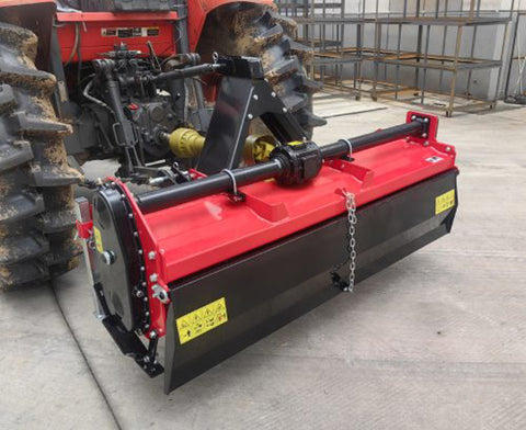 71 inch PTO rotary tiller for tractors
Red 3-point rotary tiller with 42 tines
Side view of heavy-duty tractor tiller attachment
PTO-powered tiller for 40-75 HP tractors
Rear garden rotary tiller with safety guard
Rotary tiller in warehouse – SKU IGN180