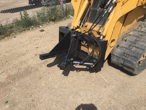 Tree and fence post puller attached to a skid steer
Side view of post puller showing steel jaws and hydraulic cylinder
Top-down view of post puller with open clamp
Puller in action removing small tree from ground
Compact and rugged post puller for skid steer