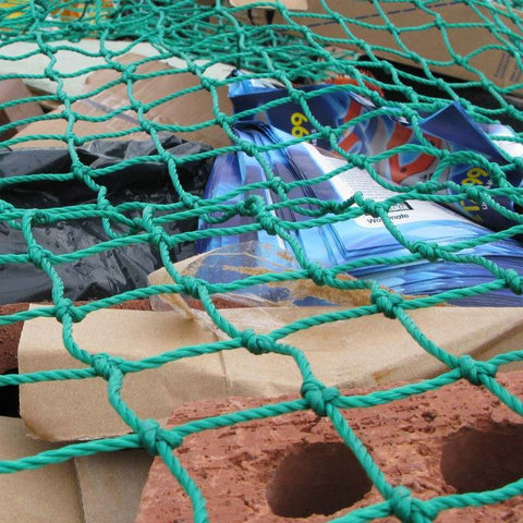 Heavy-Duty Cargo Net Securing Trailer Load – 12x8 ft with Hooks
Green Waste Load Covered by Bungee Truck Net in Trailer
Cargo Net Spread Over Pickup Truck with Reinforced Hooks
Close-Up of Nylon Cargo Net Mesh and Hook Connection
Rolled Heavy-Duty Load Net with Hook Attachments Displayed