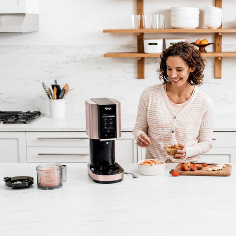 Ninja CREAMi Ice Cream Maker, for Gelato, Mix - ins, Milkshakes, Sorbet, Smoothie Bowls & More, 7 One - Touch Programs, with (2) Pint Containers & Lids, NC301CRG, Rose Gold (Canadian Version) - with | Sold by Uncle Wiener's Wholesale