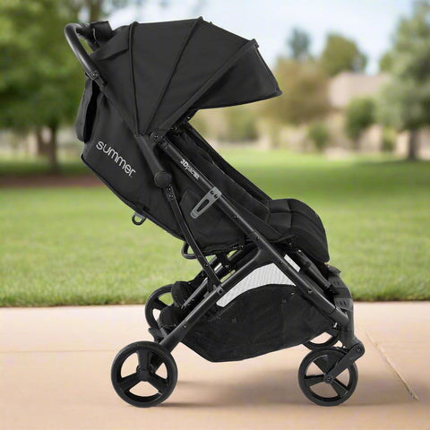 Summer Infant 3Dpac CS+ double stroller in black with car seat compatibility and large canopies
Compact lightweight double stroller with two seats and peekaboo windows
Black twin stroller folded for easy transport
Close-up of stroller seat recline and under-storage basket