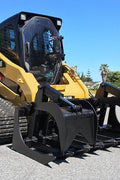72" skid steer grapple bucket front view

84" rock grapple on skid steer in action

Close-up of dual hydraulic cylinder and hose setup

Heavy-duty tines and steel frame

Grapple holding large rocks and debris


