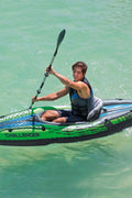 Intex Challenger K1 inflatable kayak on water

1-person green inflatable kayak set with oar and pump

Inflatable kayak with seat and cargo net

Kayak set components: paddle, pump, skeg, repair patch

Recreational lake kayak for solo paddlers