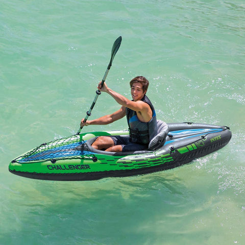 Intex Challenger K1 inflatable kayak on water

1-person green inflatable kayak set with oar and pump

Inflatable kayak with seat and cargo net

Kayak set components: paddle, pump, skeg, repair patch

Recreational lake kayak for solo paddlers
