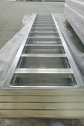 10-foot aluminum loading ramps placed on utility trailer
Heavy-duty HDR300 loading ramps close-up with grip detail
Side view of aluminum ramp showing gradual incline
Vehicle approaching wide aluminum loading ramps
Industrial pair of loading ramps for heavy machinery