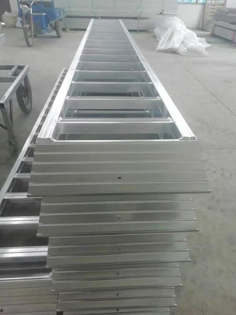 10-foot aluminum loading ramps placed on utility trailer
Heavy-duty HDR300 loading ramps close-up with grip detail
Side view of aluminum ramp showing gradual incline
Vehicle approaching wide aluminum loading ramps
Industrial pair of loading ramps for heavy machinery