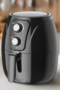 3.5L oil-free air fryer showing nonstick cooking basket with separator