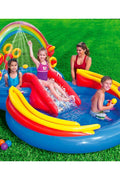Rainbow-themed inflatable paddling pool with slide

Children playing on Intex Rainbow Ring pool with water sprayer

Complete top-down view of inflatable play center

Interactive game zone on Intex kids water park