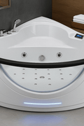 2-person corner whirlpool bathtub with LED lighting and black headrests