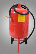 Red 20-gallon portable sandblasting tank with hose, wheels, and blasting accessories for rust and paint removal
