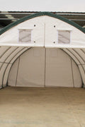 Industrial shelter with white PVC cover and front winch entry