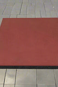 Interlocking red rubber patio tile close-up

20x20 rubber tile stacked set – top view

Playground flooring tile – angled corner

Red rubber tiles for outdoor use

Rubber tile texture – slip-resistant surface

