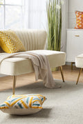 Fuchsia velvet loveseat with tufted back and gold legs in modern decor.
Ivory armless loveseat sofa with mid-century design in studio setup.
Tan velvet 2-seater with flared gold legs styled against a neutral wall.
Close-up of plush velvet texture and fluted backrest detail.
Color swatches displaying Fuchsia, Pink, Ivory, and Tan options.