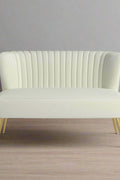 Fuchsia velvet loveseat with tufted back and gold legs in modern decor.
Ivory armless loveseat sofa with mid-century design in studio setup.
Tan velvet 2-seater with flared gold legs styled against a neutral wall.
Close-up of plush velvet texture and fluted backrest detail.
Color swatches displaying Fuchsia, Pink, Ivory, and Tan options.