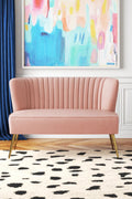 Fuchsia velvet loveseat with tufted back and gold legs in modern decor.
Ivory armless loveseat sofa with mid-century design in studio setup.
Tan velvet 2-seater with flared gold legs styled against a neutral wall.
Close-up of plush velvet texture and fluted backrest detail.
Color swatches displaying Fuchsia, Pink, Ivory, and Tan options.