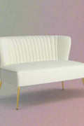 Fuchsia velvet loveseat with tufted back and gold legs in modern decor.
Ivory armless loveseat sofa with mid-century design in studio setup.
Tan velvet 2-seater with flared gold legs styled against a neutral wall.
Close-up of plush velvet texture and fluted backrest detail.
Color swatches displaying Fuchsia, Pink, Ivory, and Tan options.