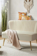 Fuchsia velvet loveseat with tufted back and gold legs in modern decor.
Ivory armless loveseat sofa with mid-century design in studio setup.
Tan velvet 2-seater with flared gold legs styled against a neutral wall.
Close-up of plush velvet texture and fluted backrest detail.
Color swatches displaying Fuchsia, Pink, Ivory, and Tan options.