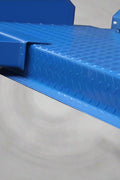 Blue portable 4-post car hoist in garage

Drive-on ramp and runway surface

Close-up of power unit and lift columns

Vehicle elevated on blue car lift

Heavy-duty safety locks and cable system