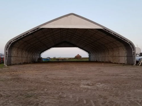 70′ WIDE DOUBLE TRUSS STORAGE BUILDINGS - with Standard 70X150X28 26.5 OZ PVC Cover | Sold by Uncle Wiener's Wholesale