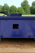 72" hydraulic soil conditioner attachment on a skid steer
Remote-controlled drum system with carbide teeth
Side view of skid steer soil conditioner in action
Soil prep tool for seedbeds and landscaping
Durable construction of 72-inch soil conditioner
