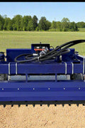 72" hydraulic soil conditioner attachment on a skid steer
Remote-controlled drum system with carbide teeth
Side view of skid steer soil conditioner in action
Soil prep tool for seedbeds and landscaping
Durable construction of 72-inch soil conditioner