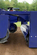 72" hydraulic soil conditioner attachment on a skid steer
Remote-controlled drum system with carbide teeth
Side view of skid steer soil conditioner in action
Soil prep tool for seedbeds and landscaping
Durable construction of 72-inch soil conditioner