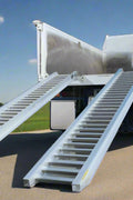 10-foot aluminum loading ramps placed on utility trailer
Heavy-duty HDR300 loading ramps close-up with grip detail
Side view of aluminum ramp showing gradual incline
Vehicle approaching wide aluminum loading ramps
Industrial pair of loading ramps for heavy machinery
