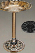 Antique copper polyresin bird bath with solar fountain

Top-down view of bird bath basin and solar pump

Decorative outdoor bird bath with stable pedestal base

Multiple fountain head options for water spray pattern

Garden setting with bird bath and solar-powered water feature