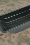Heavy-duty black utility sled for winter outdoor hauling
Plastic hunting sled with tow rope and rugged HDPE build
Side view of winter snow sled for gear and firewood transport