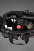 Black tactical backpack front view with MOLLE system and straps

Compact hiking backpack for camping and survival gear

Side view of military tactical backpack with rugged zippers

Outdoor travel backpack with padded shoulder straps

MOLLE-compatible tactical bag for hiking, trekking, and everyday use