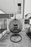 Egg Chair Swing on Patio with Gray Cushion

Hanging Egg Chair with Stand – Outdoor Setup

Egg Chair Basket Frame Close-Up

Dark Gray Cushion Detail

Indoor Setup of Egg Hammock Chair