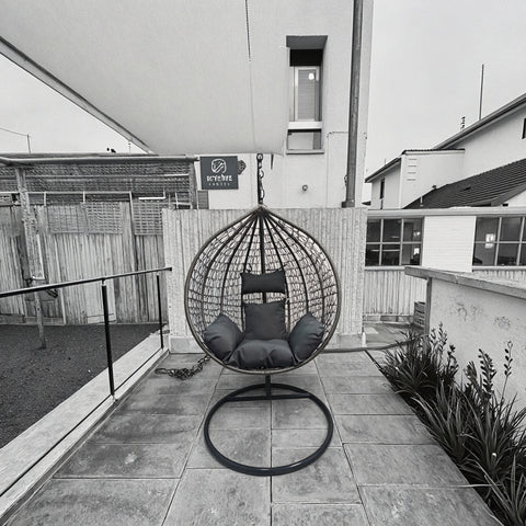 Egg Chair Swing on Patio with Gray Cushion

Hanging Egg Chair with Stand – Outdoor Setup

Egg Chair Basket Frame Close-Up

Dark Gray Cushion Detail

Indoor Setup of Egg Hammock Chair