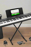 Alesis Recital Play digital piano with accessories bundle
88-key digital piano with stand and gig bag
USB MIDI piano setup for students and beginners
Full view of Alesis Recital Play with pedal and stand
Piano demo showing voices, rhythms, and modes