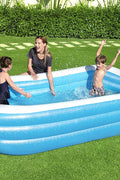 Bestway inflatable rectangular paddling pool with family inside

Top-down view of Bestway blue inflatable pool

Inflatable pool on grass with children playing

Side angle of Bestway pool showing two air chambers

Dimensions of Bestway family pool

Family enjoying inflatable pool in the backyard

Rectangular Bestway paddling pool setup outdoors