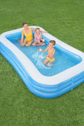 Bestway inflatable rectangular paddling pool with family inside

Top-down view of Bestway blue inflatable pool

Inflatable pool on grass with children playing

Side angle of Bestway pool showing two air chambers

Dimensions of Bestway family pool

Family enjoying inflatable pool in the backyard

Rectangular Bestway paddling pool setup outdoors